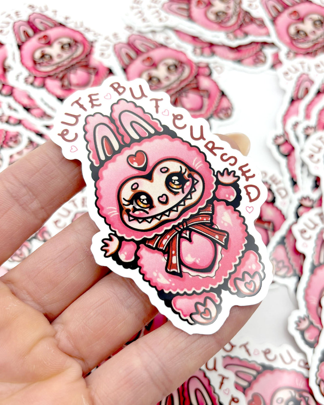 Cute But Cursed Sticker - Ella Mobbs